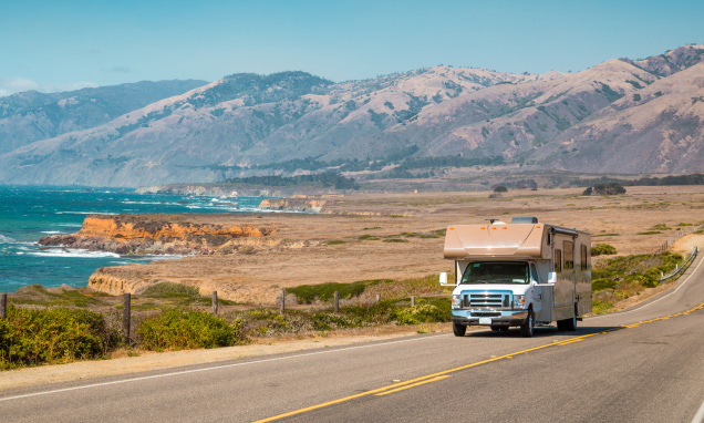 RV driving along the coast in California